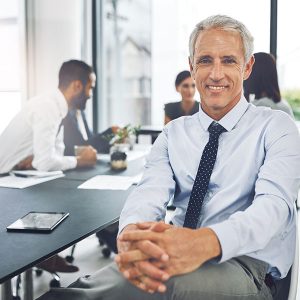 Man smiling during meeting